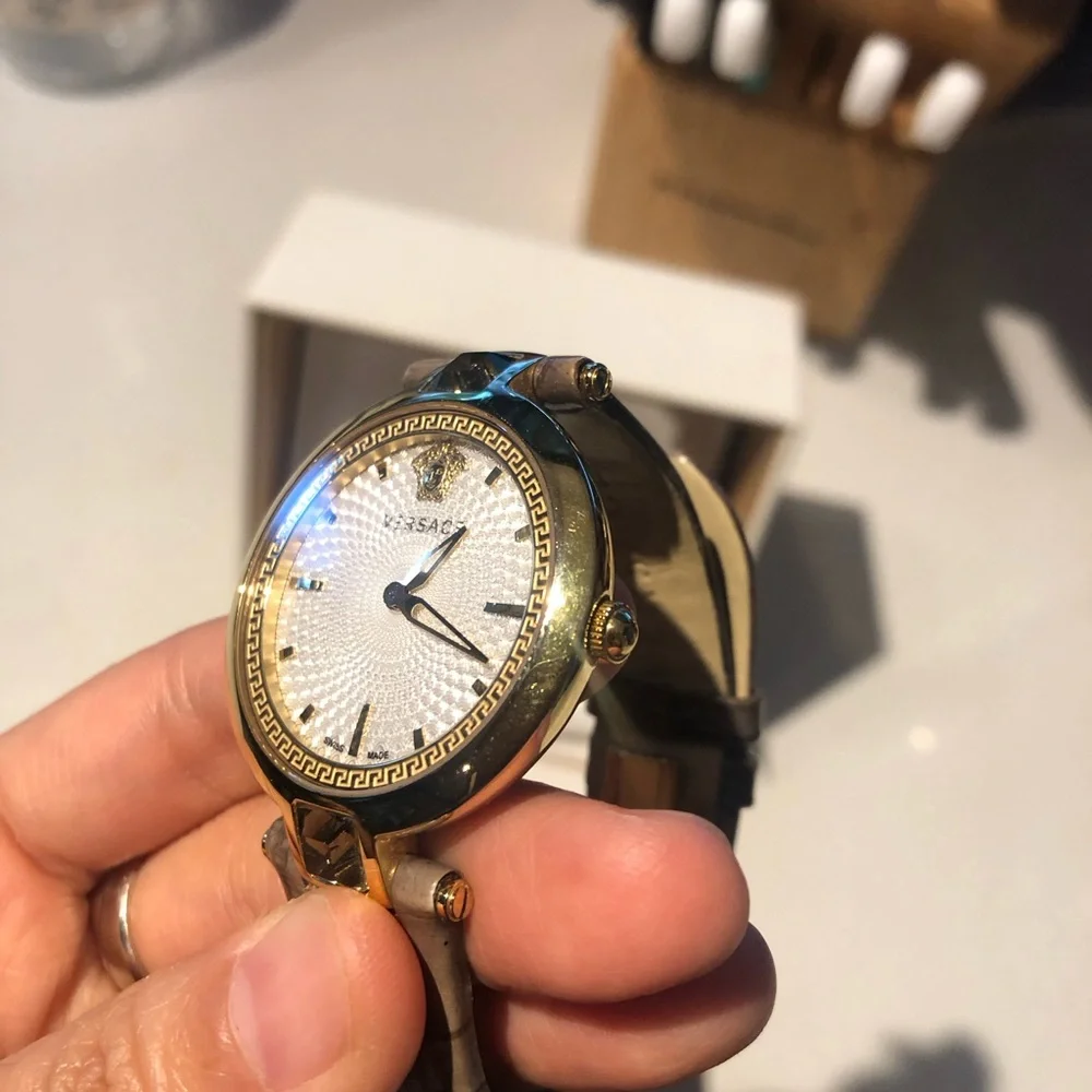 Versace White Dial Watch with Gold Bezel and Brown Strap